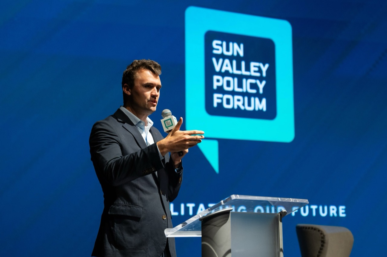A speaker addresses the Forum in front of the SVPF stage